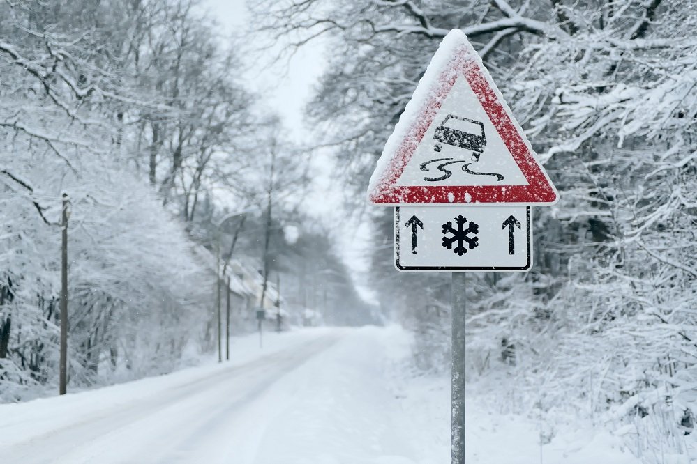 winter driving road sign