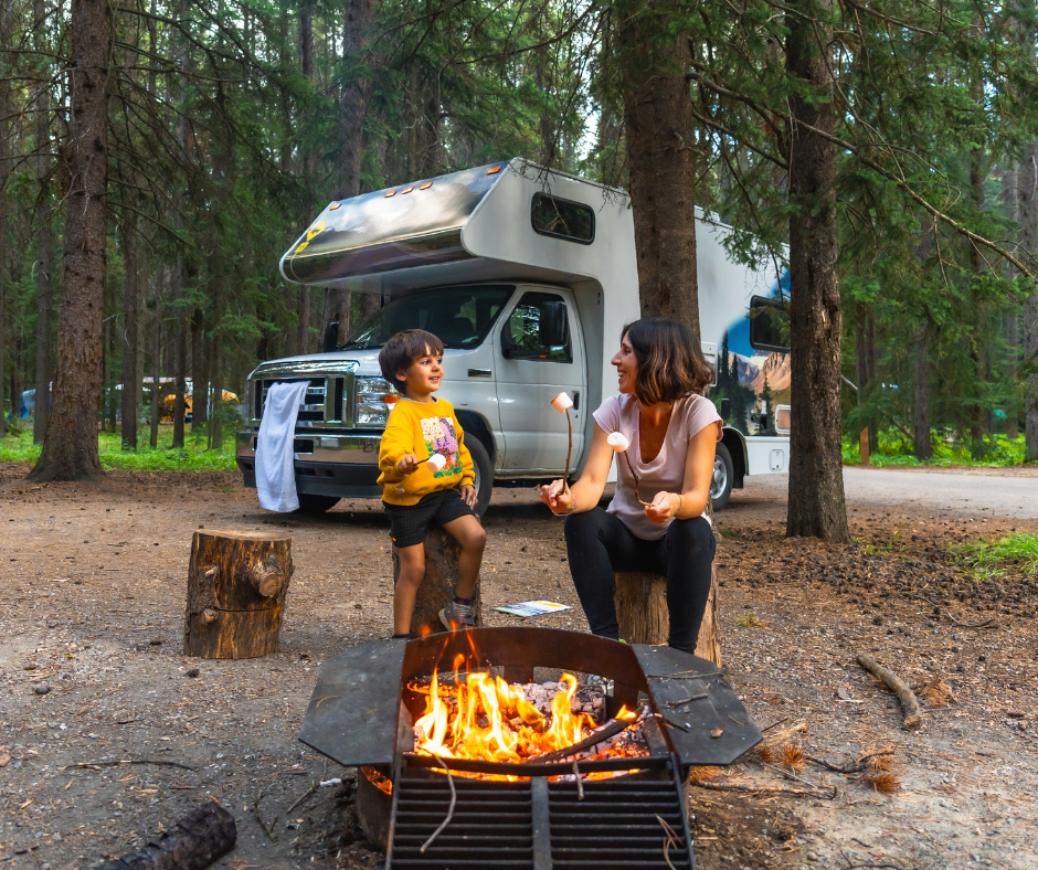 camper van with mom and son